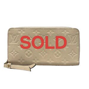 LOUIS VUITTON Portefeuille Clmence Dune Monogram Empreinte - 549-061625
